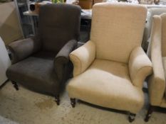 Two modern upholstered scroll arm armchairs, one in dark brown, the other in beige,