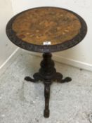 A late Victorian walnut occassional table,