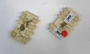 A pair of Japanese Meiji period ivory and gilt decorated bezique markers,