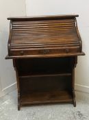 An early 20th Century oak student's desk,