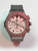 A copy Hublot Big Bang chronograph with two subsidary dials and date aperture