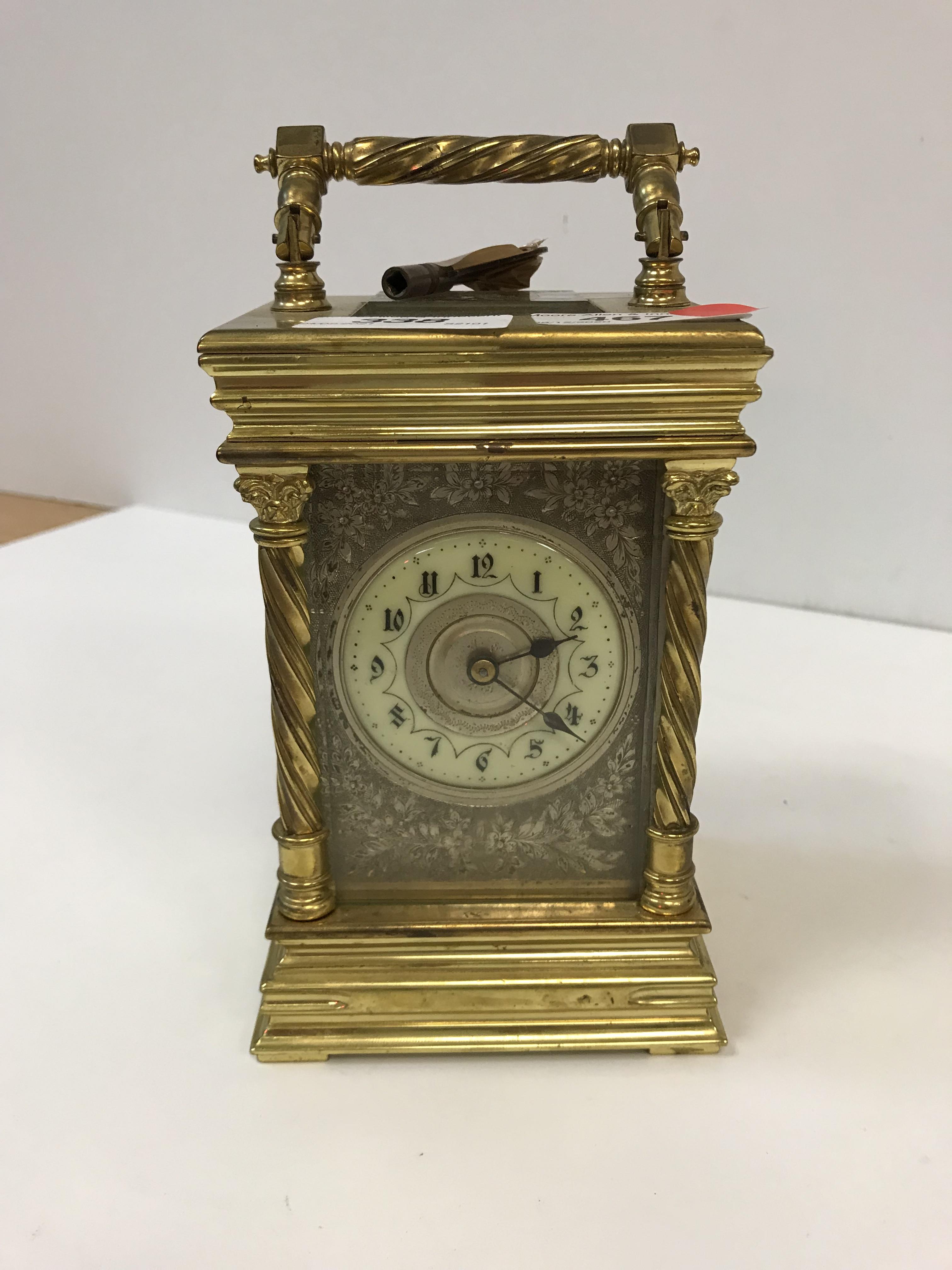 A late 19th century gilt brass cased French carriage clock,