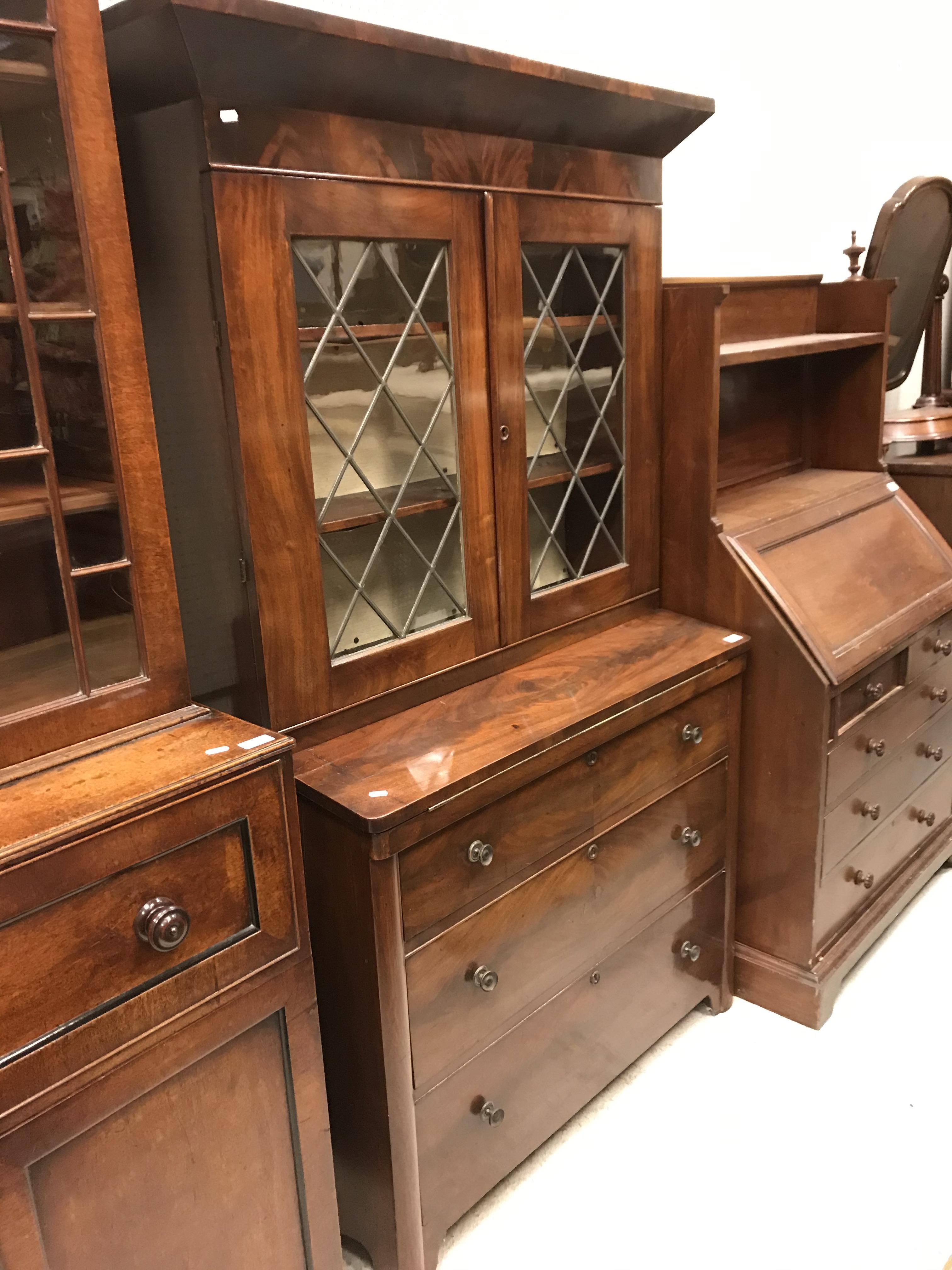 A 19th Century figured mahogany secretaire bookcase,