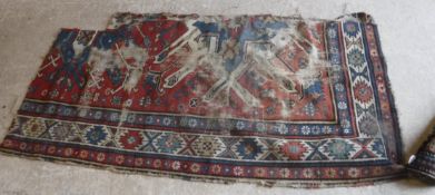 Three Caucasian carpet sections, all in red and blue, approx 162 cm x 80 cm,