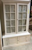 A 20th Century painted display cabinet in the 19th Century manner,