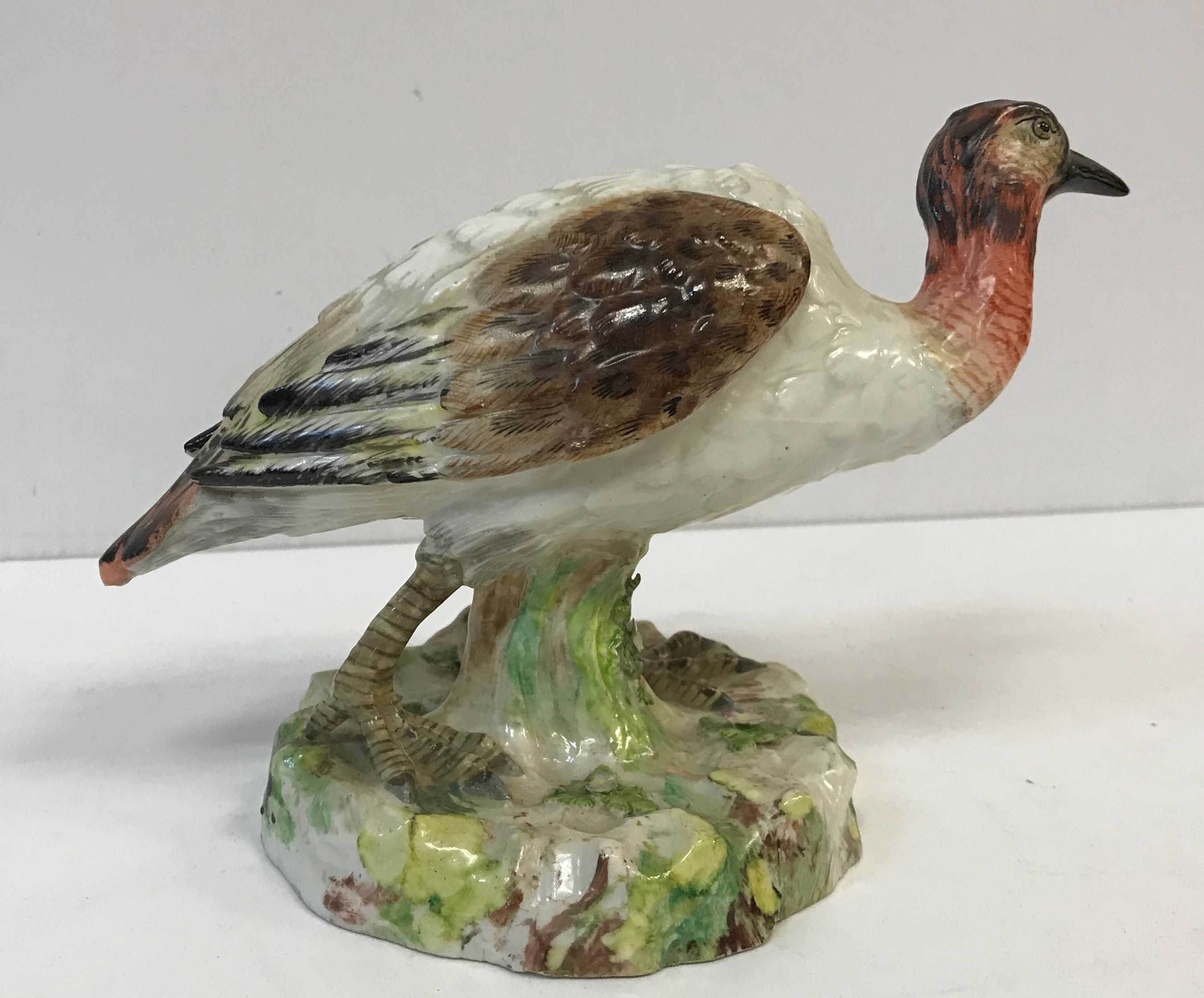 An early 19th Century Kändler style figure of an exotic bird on a mossy base, - Image 2 of 3