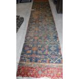 A large Ushak carpet section with foliate decoration in red and green,