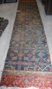 A large Ushak carpet section with foliate decoration in red and green,