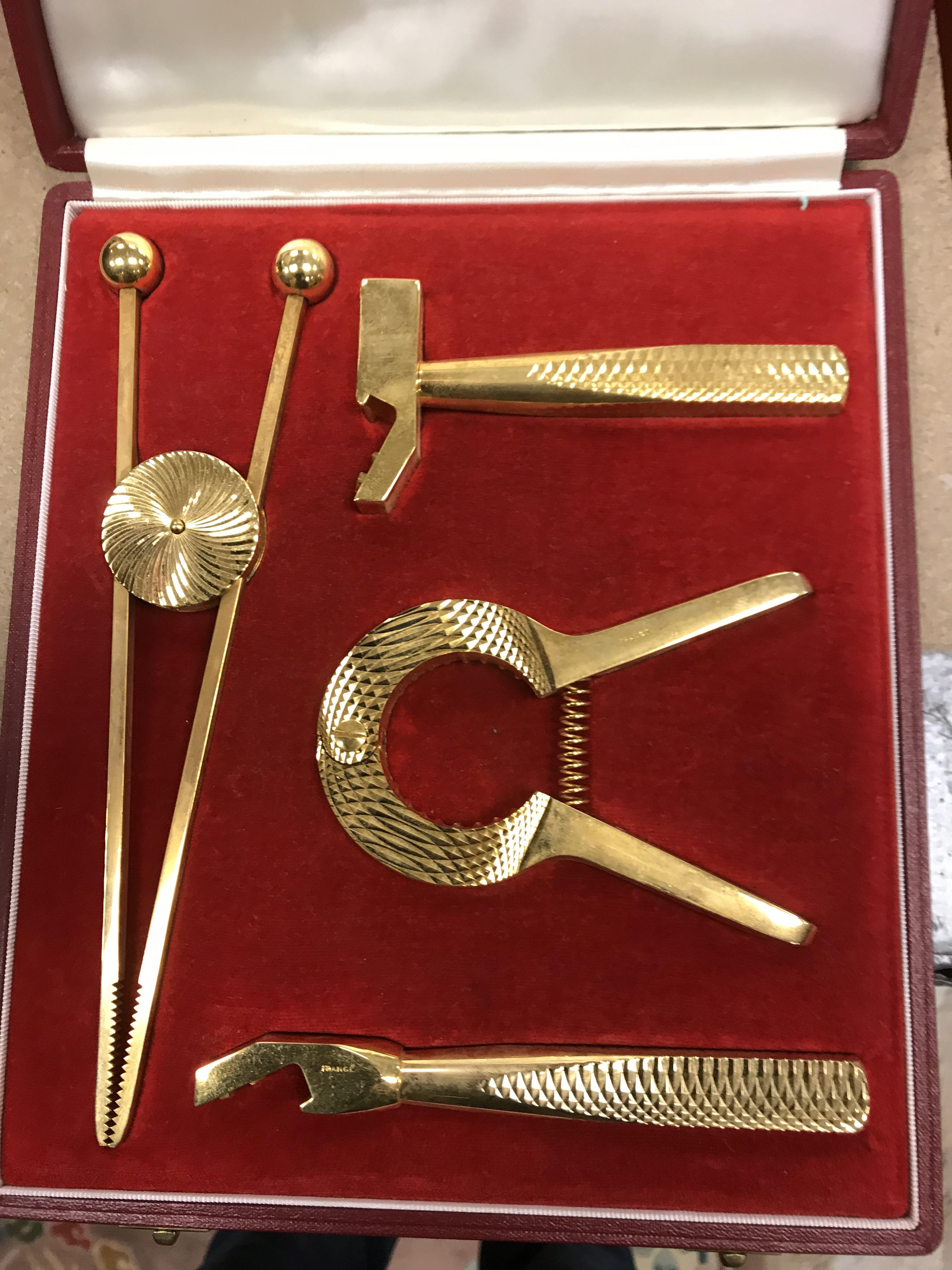 An early 1970's French gilt metal cocktail set with champagne cork remover, - Image 8 of 20
