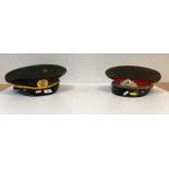 Two Russian military peaked caps,