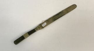 A 19th Century Chinese paperknife with jade and white metal banded handle and white metal blade,