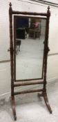 An early 19th Century mahogany framed cheval mirror,