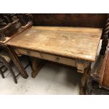 A late Victorian Aesthetic oak and inlaid writing table in the style of Godwin,