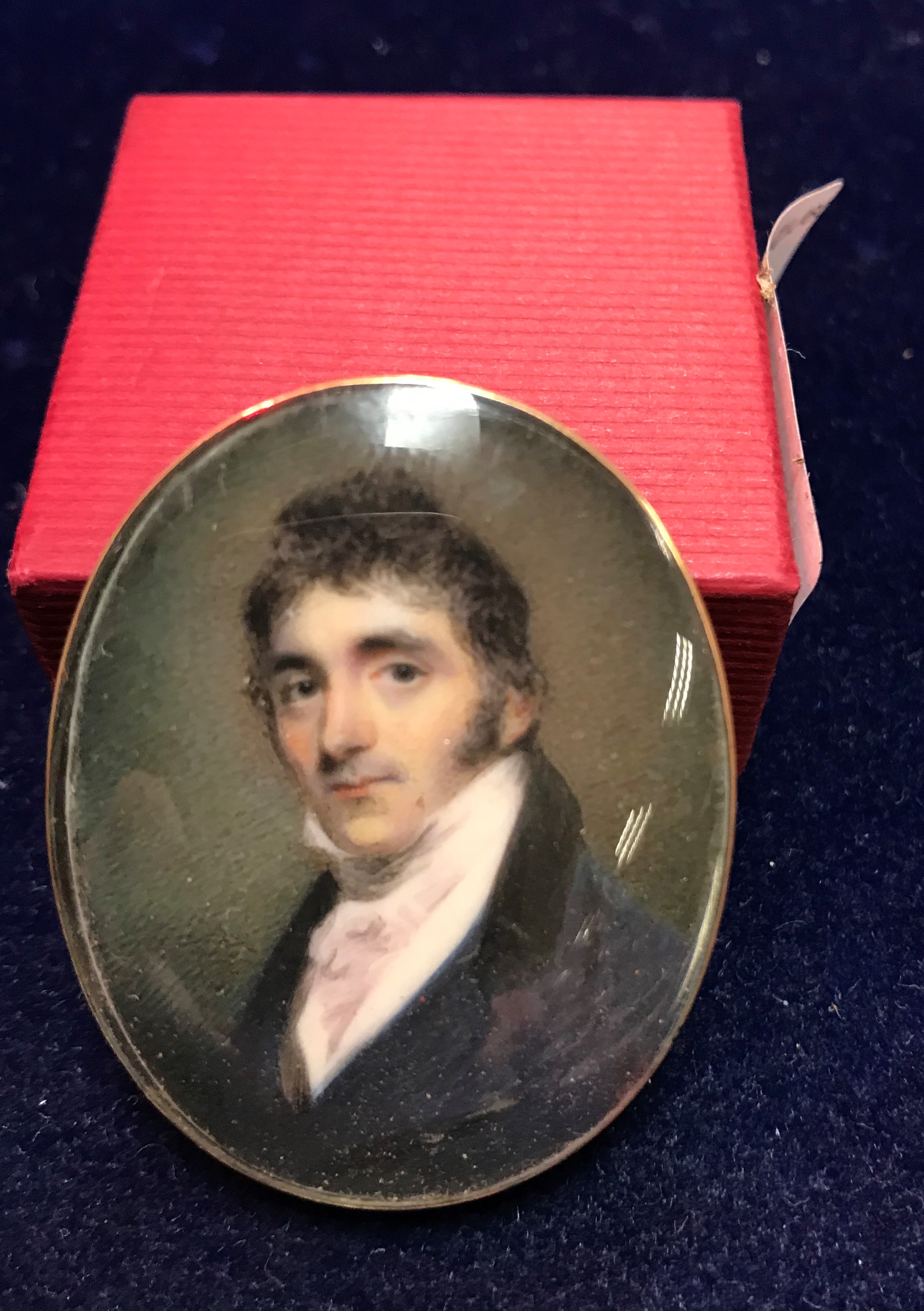 EARLY 19TH CENTURY ENGLISH SCHOOL "Gentleman in blue coat with black velvet collar and white stock",