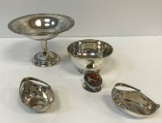 An Edwardian silver tazza with shell embossed and gadrooned rim,