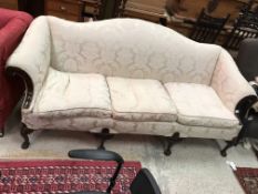 A late 19th / early 20th Century mahogany show frame sofa in the Chippendale taste,