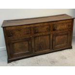 An 18th Century elm enclosed dresser,