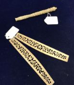 A 19th Century Chinese carved ivory handle in three sections with all over floral and foliate