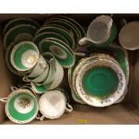 A set of 12 Royal Worcester set of twelve coffee cans and saucers (some with staining and damage),