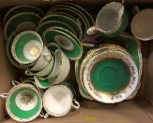 A set of 12 Royal Worcester set of twelve coffee cans and saucers (some with staining and damage),