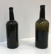 An early 19th Century black glass seal bottle inscribed "M-J.