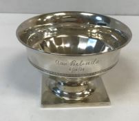 A George V silver pedestal bowl on square foot,