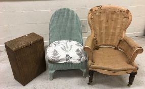 A Victorian balloon back salon chair with serpentine front rail on turned legs to castors (for