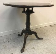 A George III mahogany tea table,