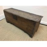 An 18th Century elm hutch or six plank coffer,