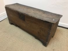 An 18th Century elm hutch or six plank coffer,