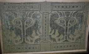 An early green velvet/silk work embroidered panel of two pairs of exotic lions flanking a tree,