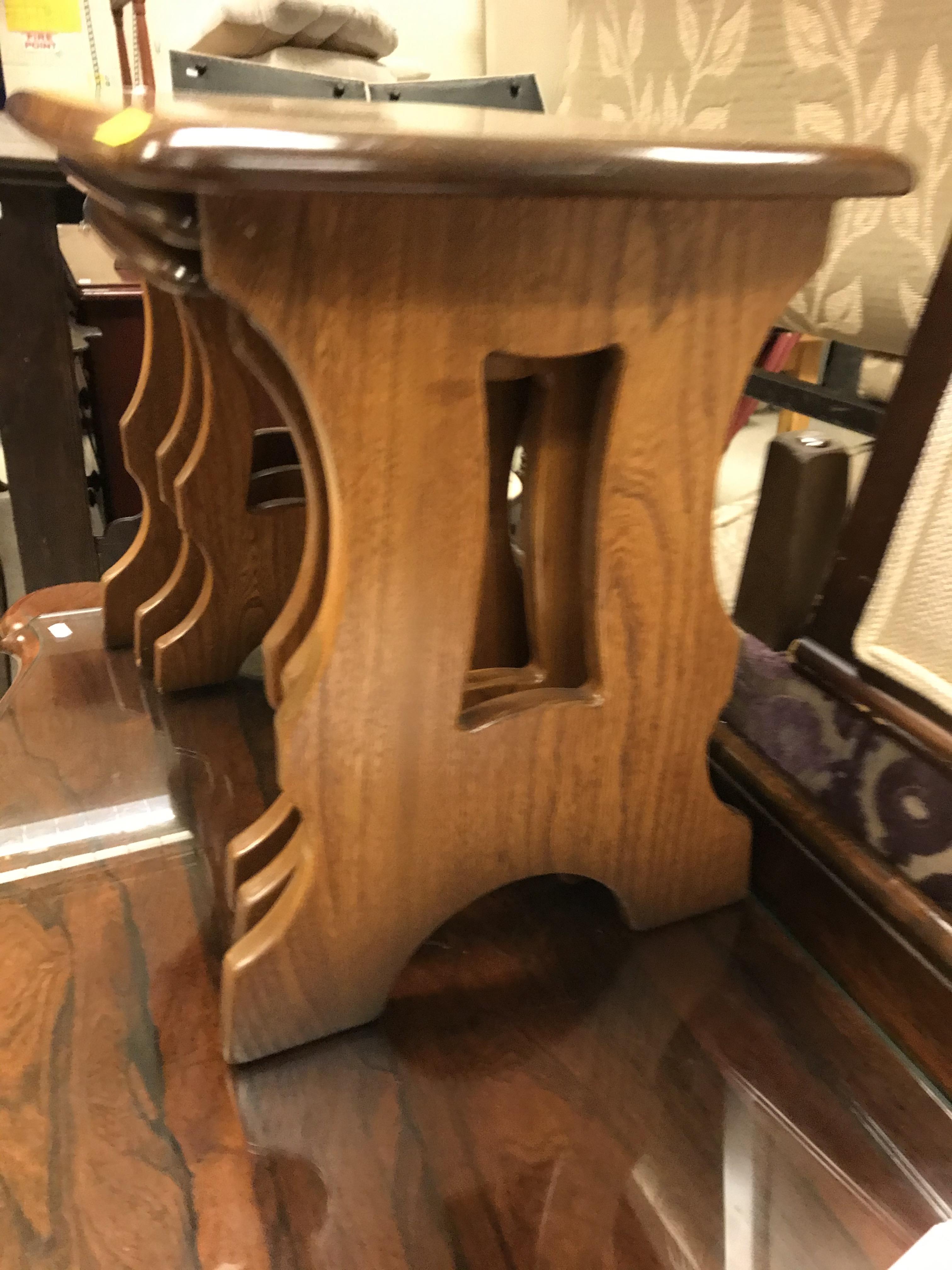 An Ercol elm nest of tables, 57 cm x 35.5 cm x 42 cm high (largest), 34 cm x 25.5 cm x 36. - Image 9 of 25