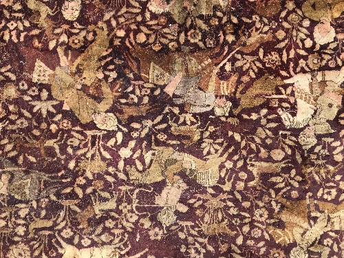 An early 20th Century Agra North India carpet with centre medallion on a wine-coloured ground, - Image 67 of 103