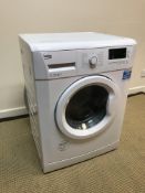 A Beko WM74145W 7 kg 1400 rpm washing machine,