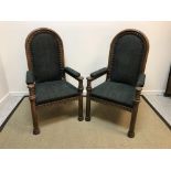 A pair of circa 1900 Continental oak throne-type chairs,