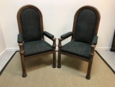 A pair of circa 1900 Continental oak throne-type chairs,