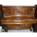A Russell burr walnut cased upright piano with inlaid decoration and straight string iron framed