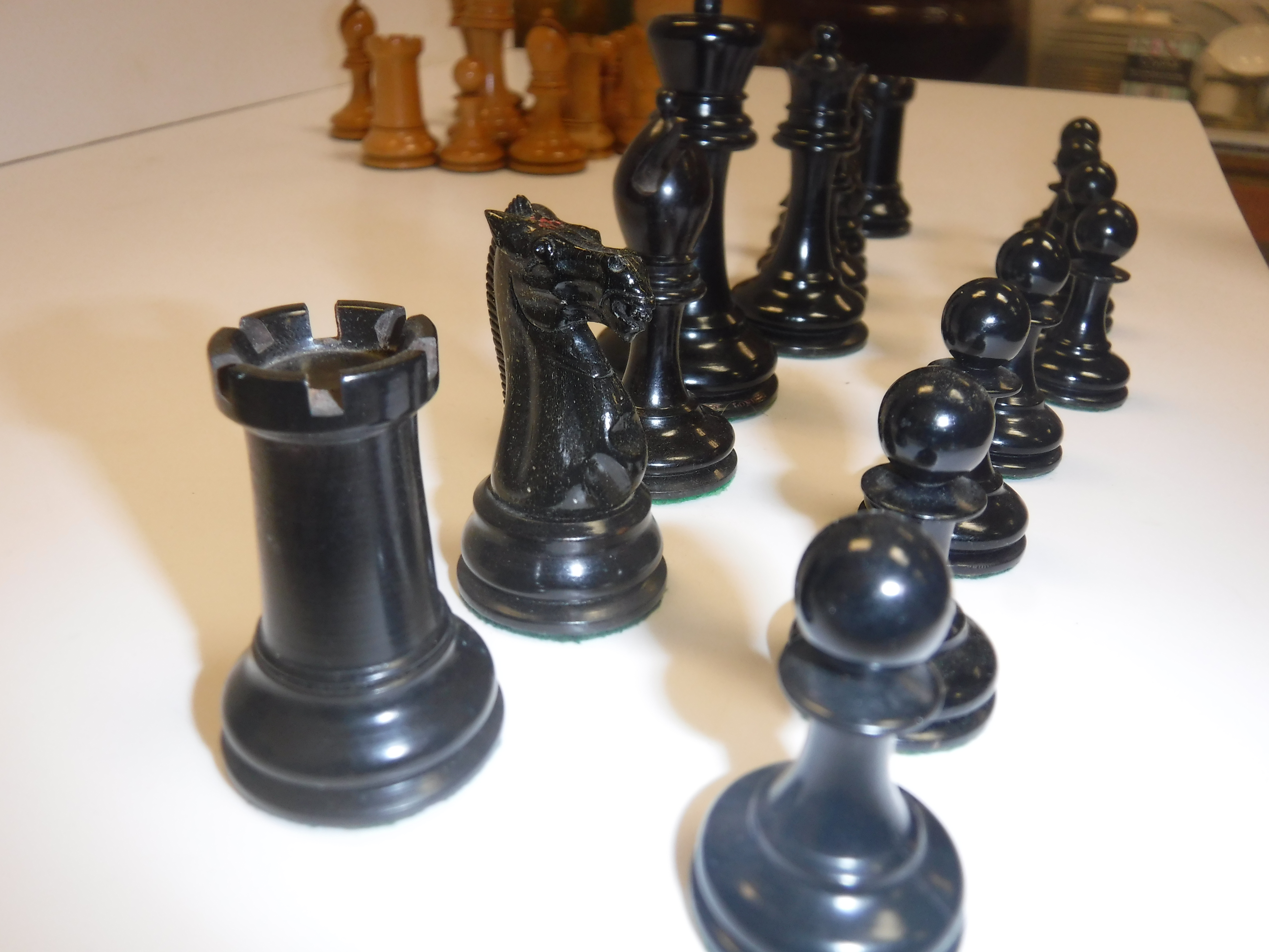 A Staunton chess set by Jacques & Son of London in boxwood and ebonised form (one rook with dog - Image 14 of 25