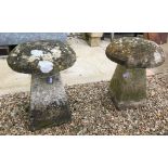 A pair of natural stone staddlestones of typical form,