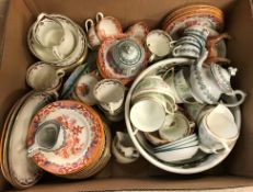 A collection of various china wares to include English chinoiserie decorated oxide red ground