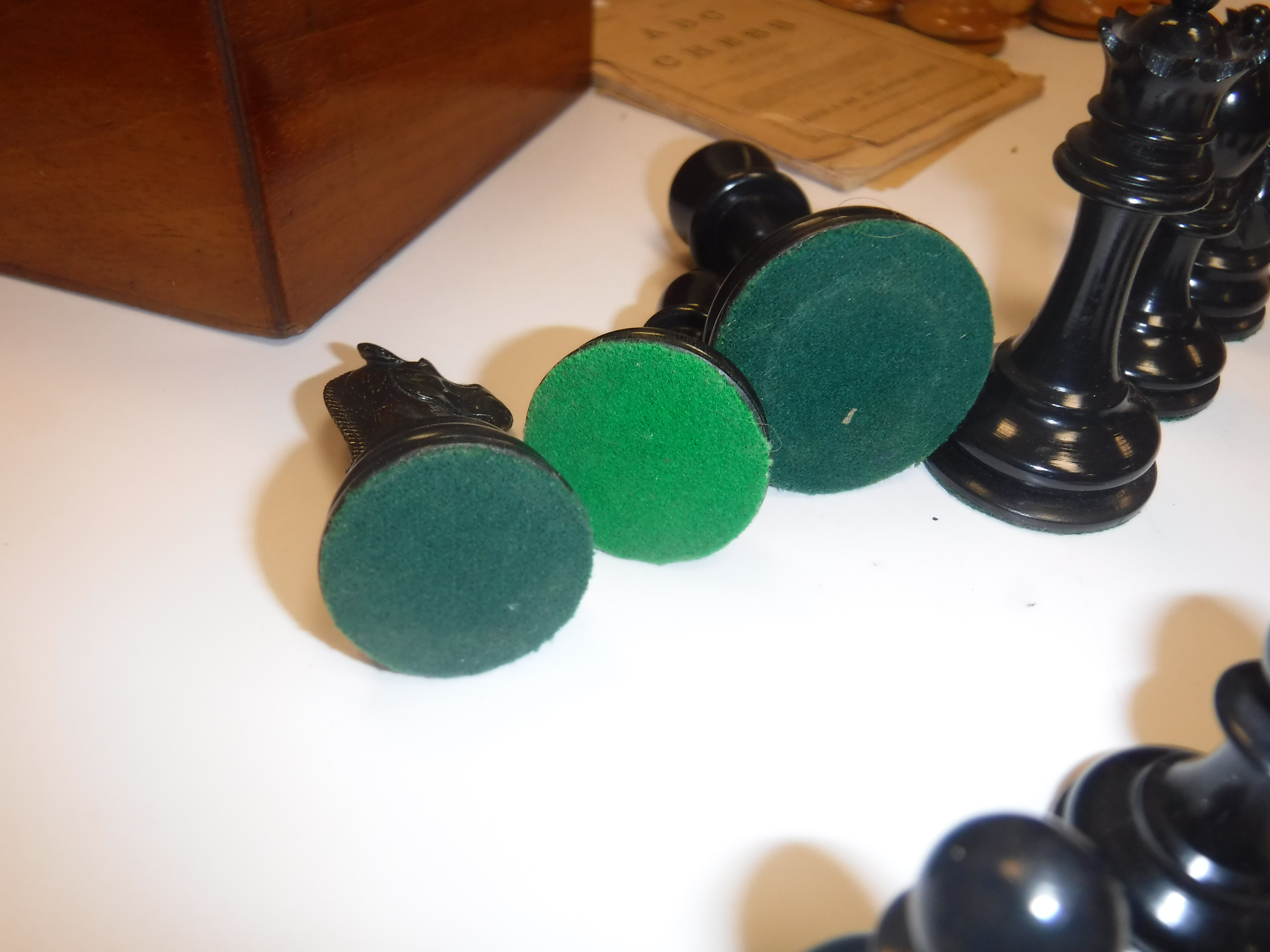 A Staunton chess set by Jacques & Son of London in boxwood and ebonised form (one rook with dog - Image 20 of 25