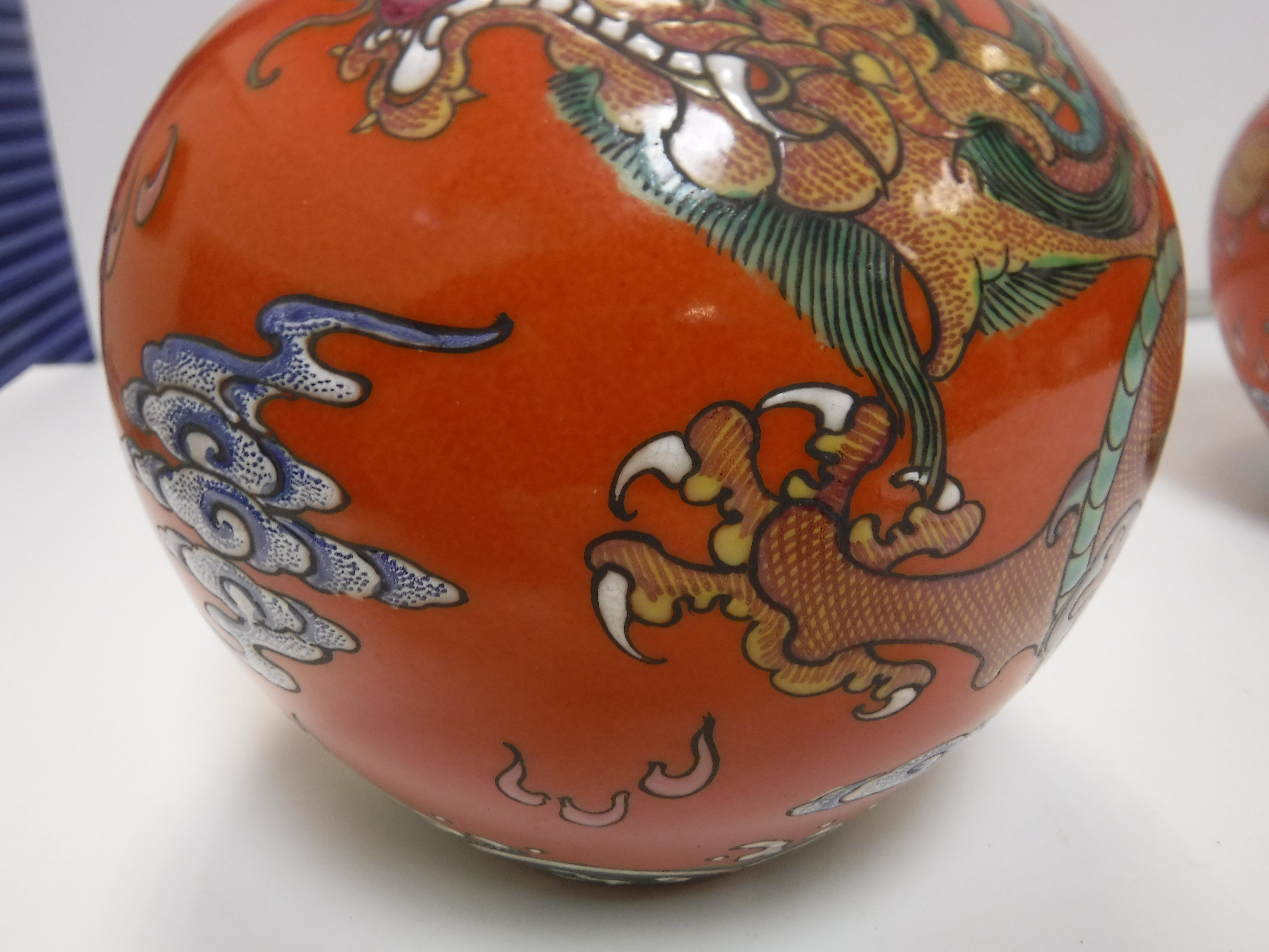 A pair of circa 1900 Chinese oxide red ground five toed dragon decorated vases bearing blue - Image 13 of 18