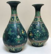 A pair of Chinese glazed porcelain 'Fahua' pear shaped vases with flared rims,