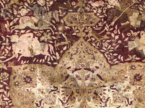 An early 20th Century Agra North India carpet with centre medallion on a wine-coloured ground, - Image 41 of 103