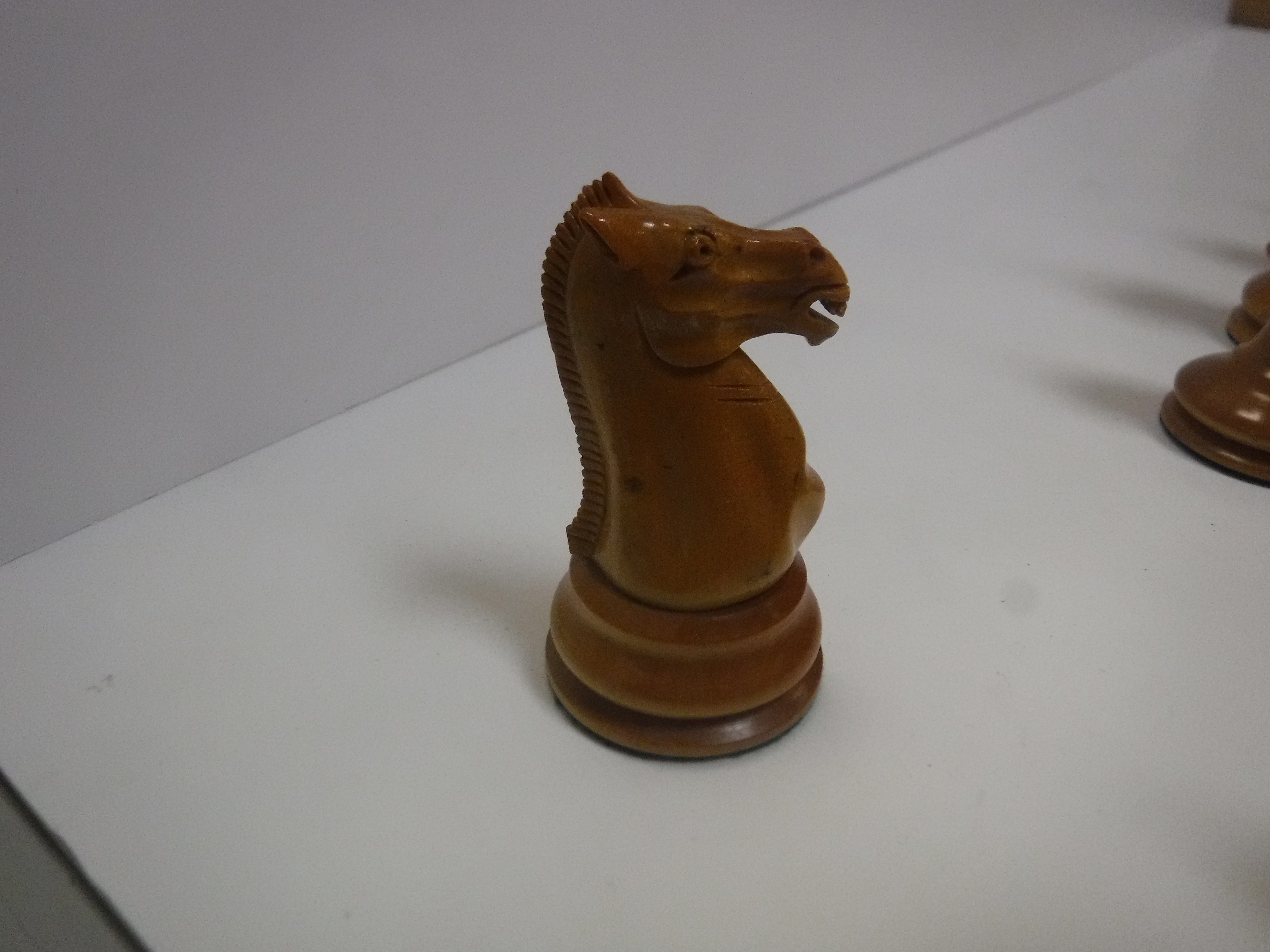A Staunton chess set by Jacques & Son of London in boxwood and ebonised form (one rook with dog - Image 6 of 25