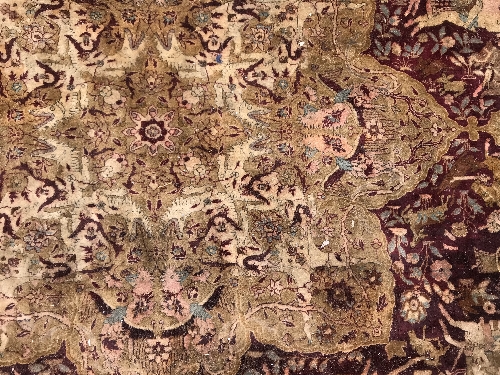 An early 20th Century Agra North India carpet with centre medallion on a wine-coloured ground, - Image 47 of 103