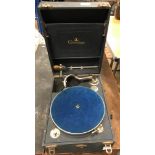 A vintage Chorister portable or tabletop gramophone in leatherette-style case,