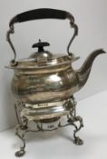 A George V silver spirit kettle of baluster rectangular form,