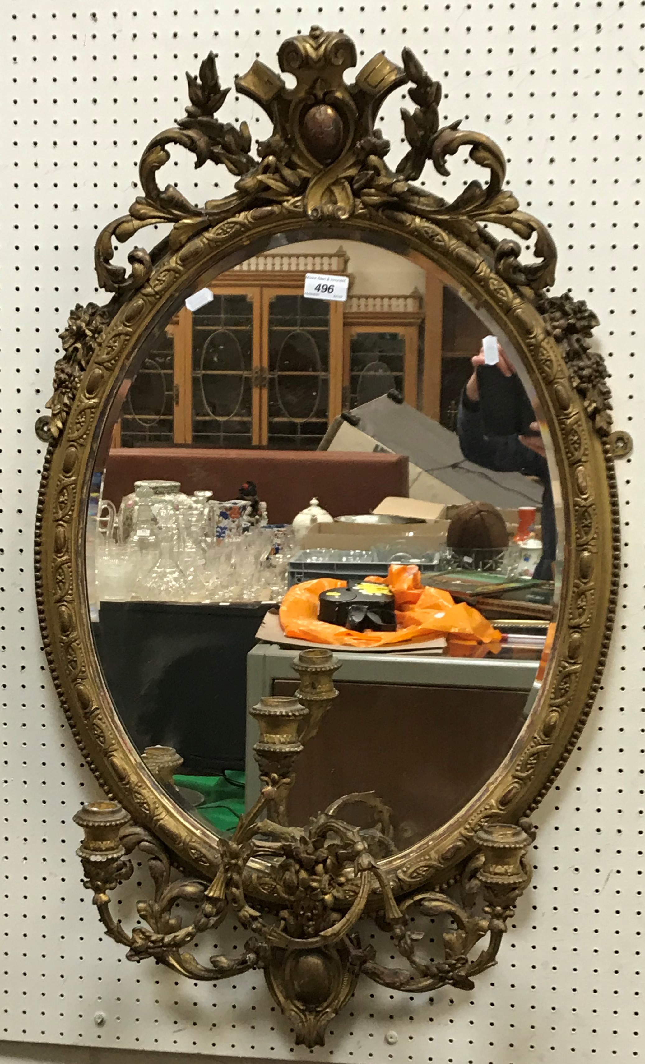 A 19th Century giltwood and gesso framed girandole mirror with all over foliate decoration