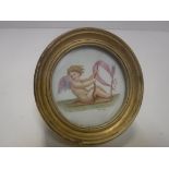 J THORLEY "Cherub", watercolour on porcelain back, signed lower right, image including frame 9.